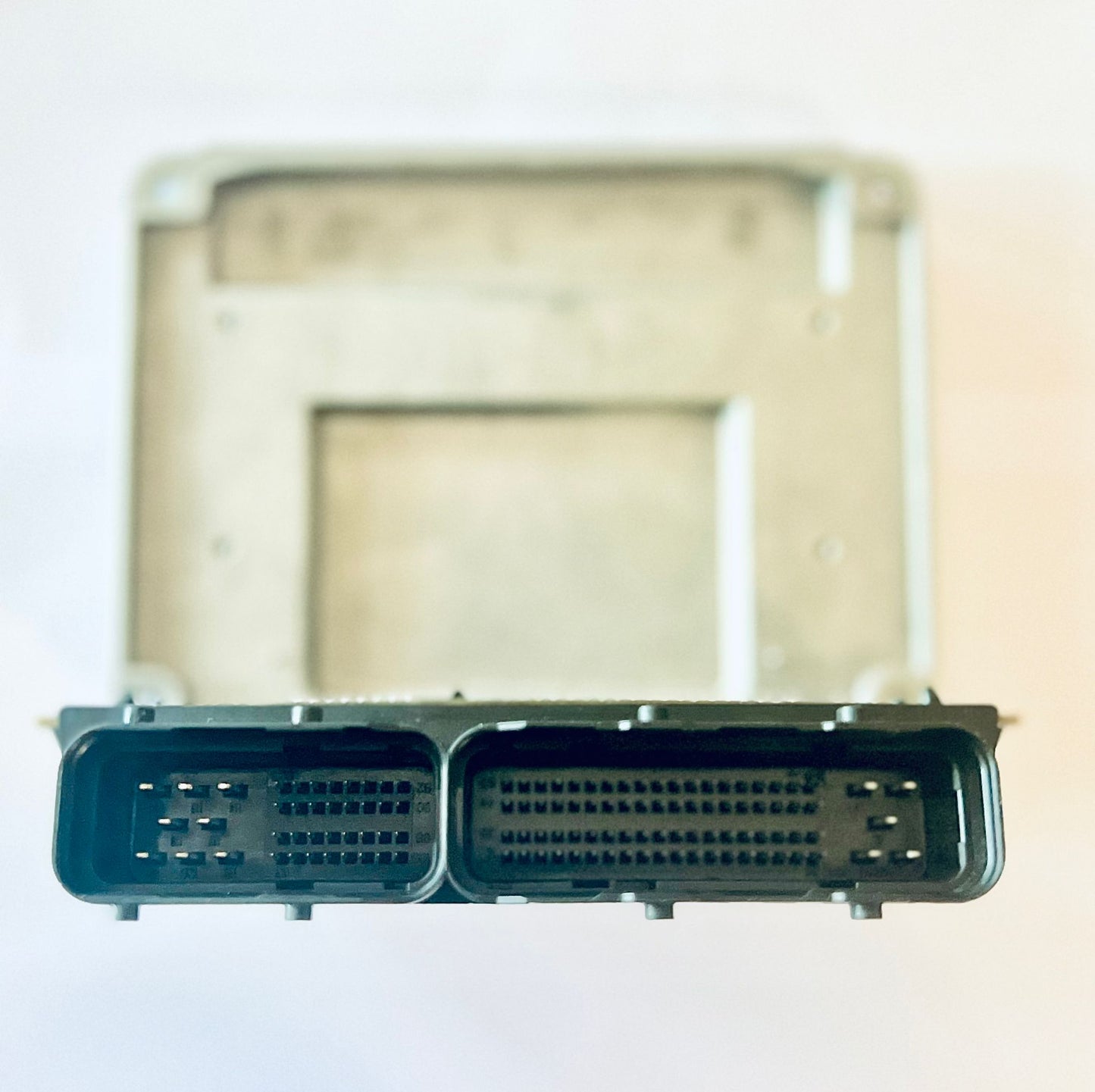 A black Plug-and-Play Standalone ECU Art of Speed for vehicles, with visible circuitry and connectors.
