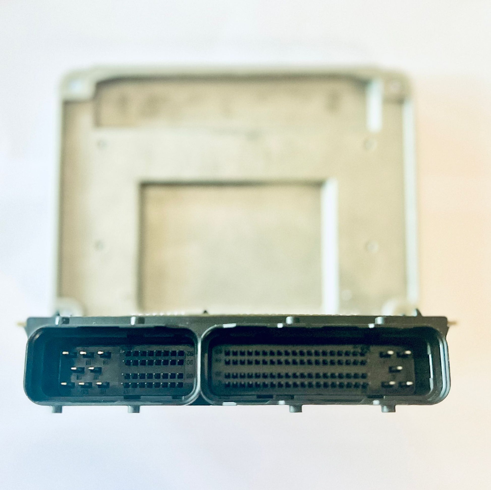 A black Plug-and-Play Standalone ECU Art of Speed for vehicles, with visible circuitry and connectors.
